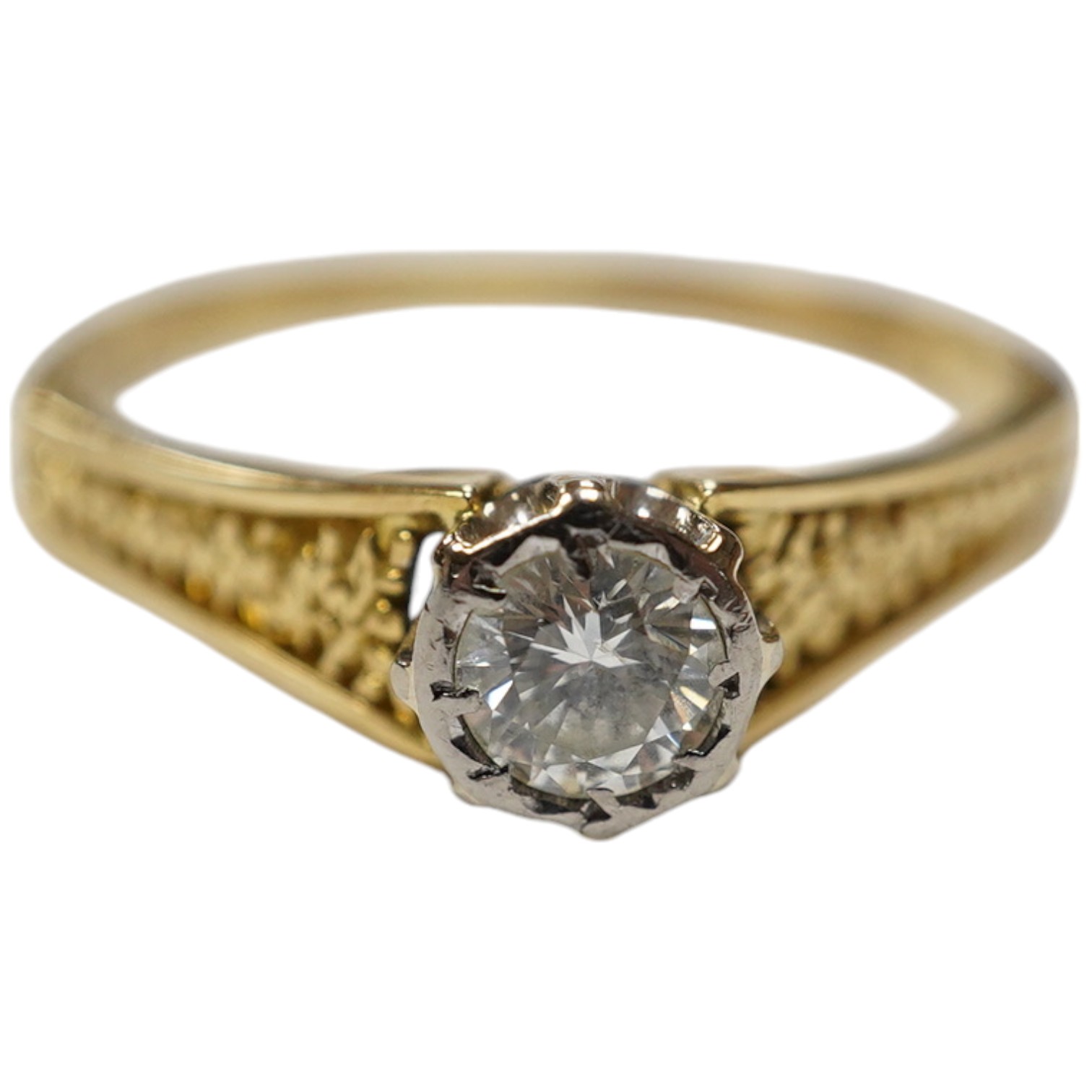 A yellow metal and illusion set solitaire diamond ring, size O/P, gross weight 2.7 grams. Condition - fair